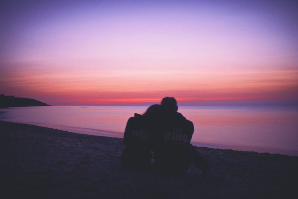 romantic couple sitting together