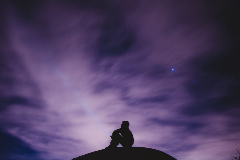 a boy looking at sky