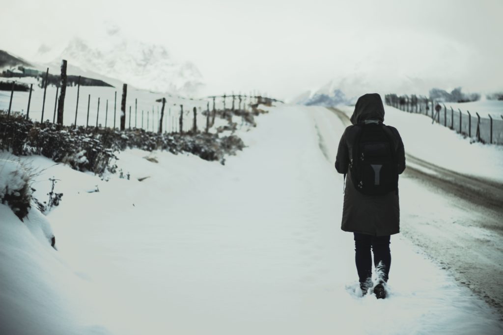 girl walking on road