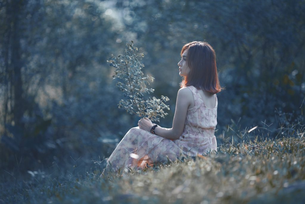 girl sitting alone