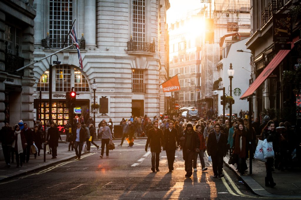 view of street with crowd in sunset